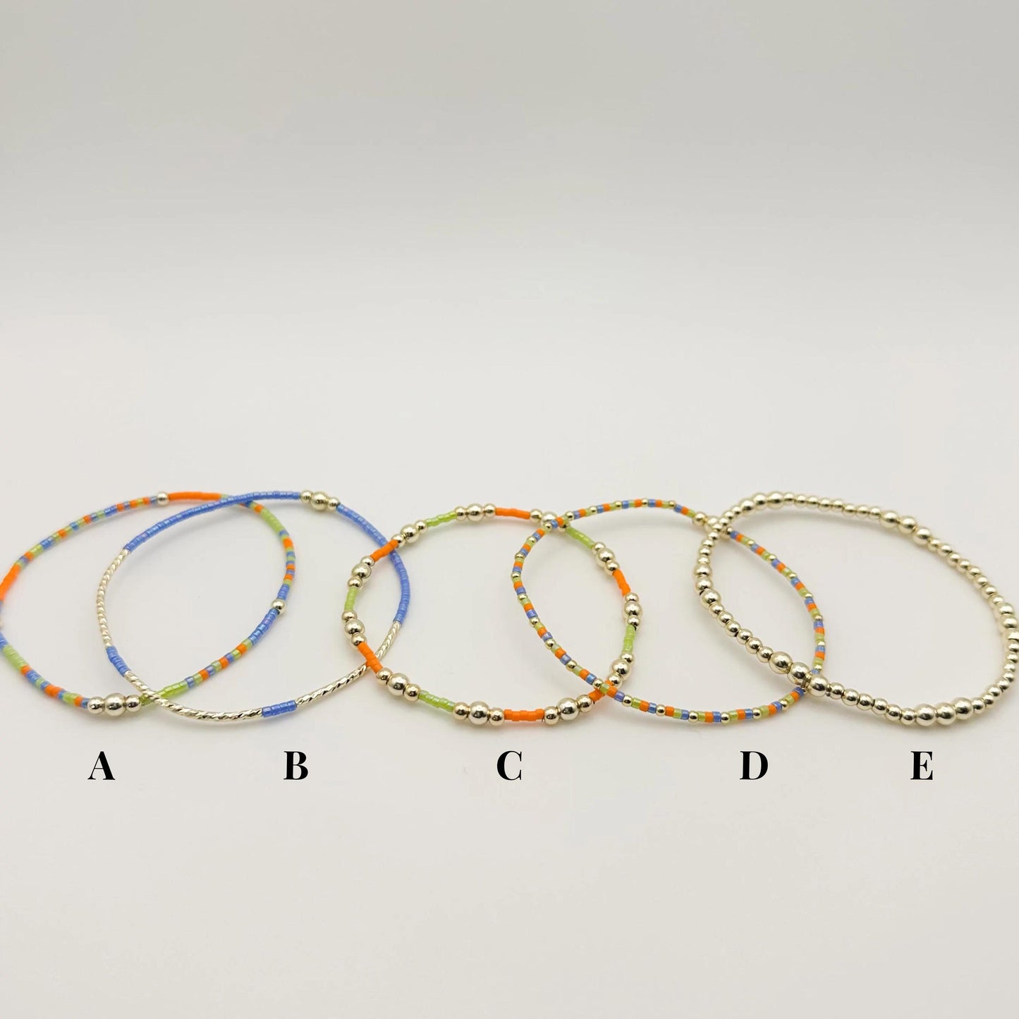 Vacay fun | 14k gold filled with green, blue and orange bracelet stack