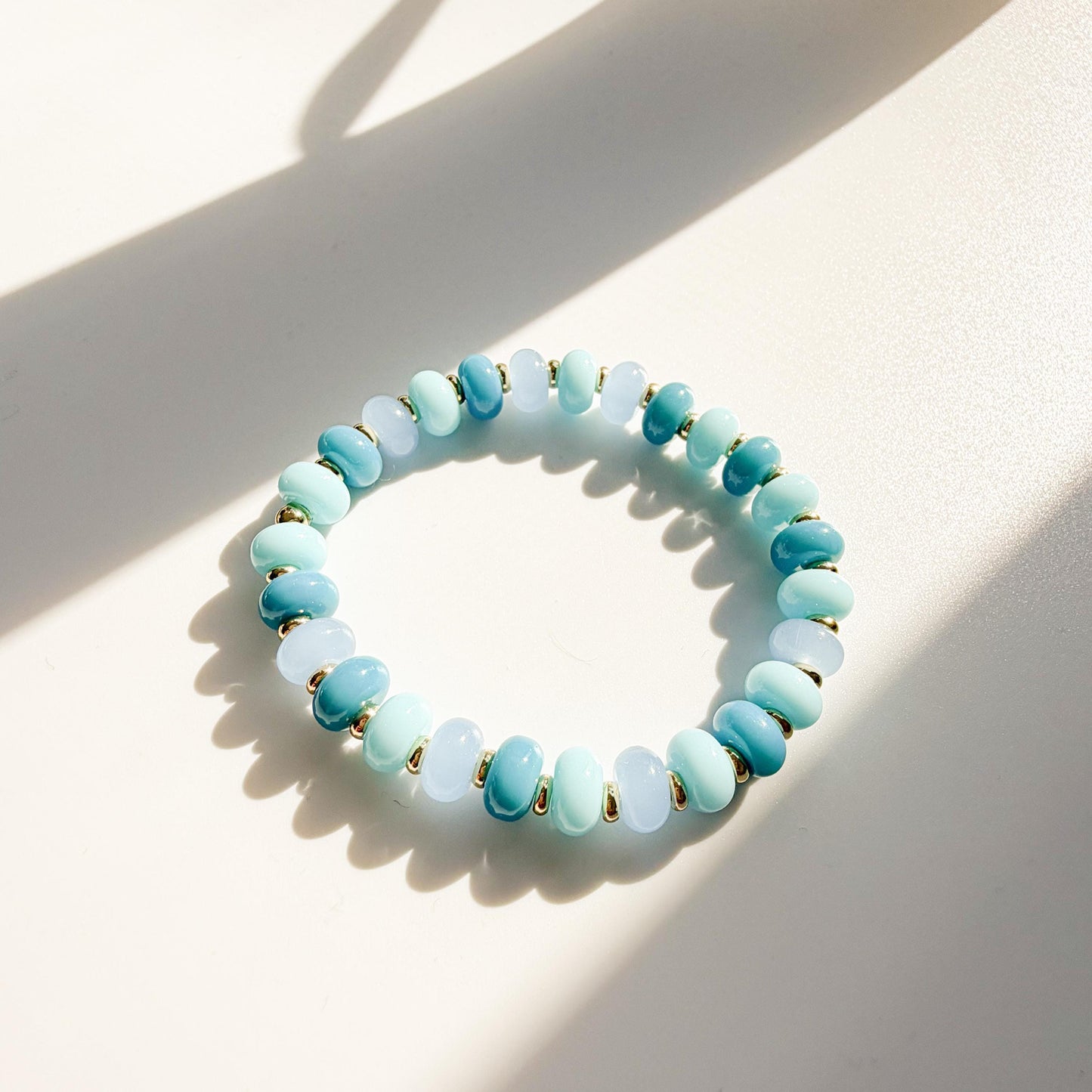 Ocean Blues Mix | 18k Gold Filled with Blue, Soft Blue and Teal Flat Rondelle Beads | Colorful | Beaded Stretch Bracelet | Transparent bead