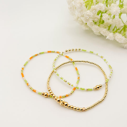 Orange and Cream 3 Piece Stack | 18k Gold Filled Seed Bead Bracelet Stack: Orange, Green, Cream | Tiny Bead Bracelet
