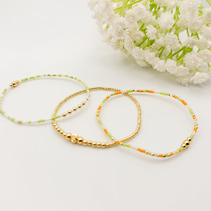 Orange and Cream 3 Piece Stack | 18k Gold Filled Seed Bead Bracelet Stack: Orange, Green, Cream | Tiny Bead Bracelet