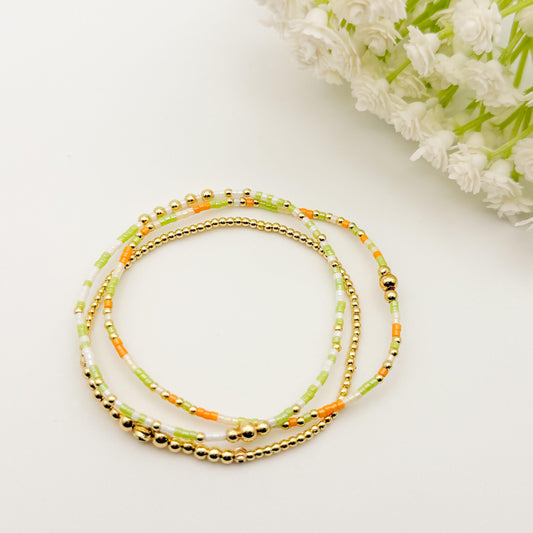 Orange and Cream 3 Piece Stack | 18k Gold Filled Seed Bead Bracelet Stack: Orange, Green, Cream | Tiny Bead Bracelet
