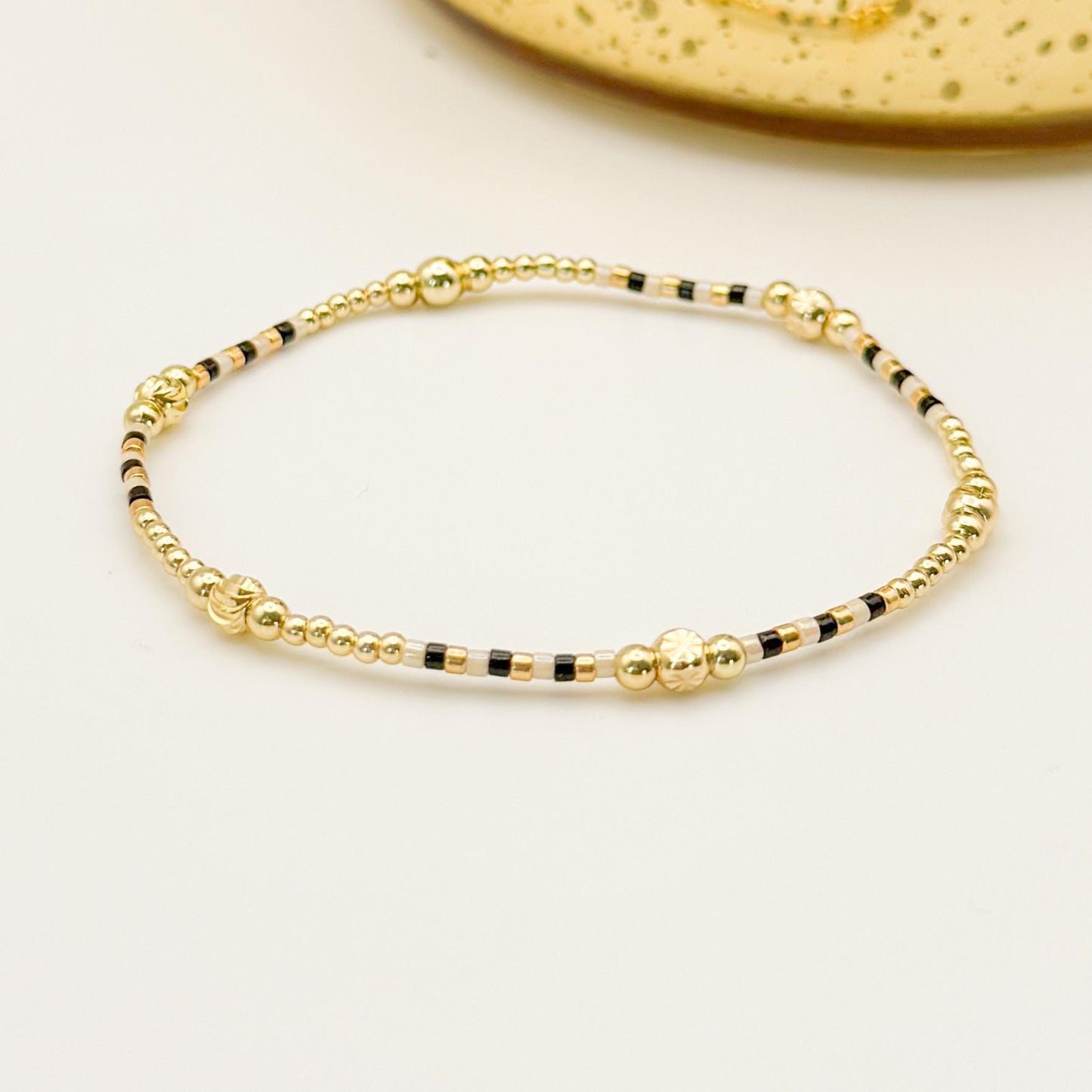 Midnight Glow | 18k gold filled with black and cream bracelet stack | beaded stretch bracelet | tiny bead bracelet | seed bead | holiday