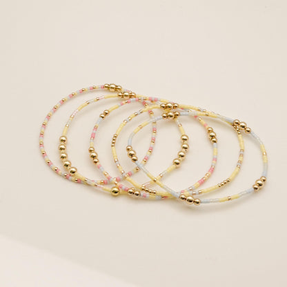 Signature Pastel Stack | 14k Gold Filled Non-Tarnish with Baby Blue, Butter Yellow and Pink  Seed Beads | Stretch Bracelet Stack | Tiny Beads
