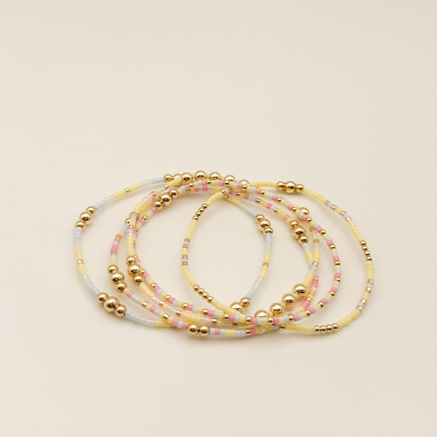 Signature Pastel Stack | 14k Gold Filled Non-Tarnish with Baby Blue, Butter Yellow and Pink  Seed Beads | Stretch Bracelet Stack | Tiny Beads
