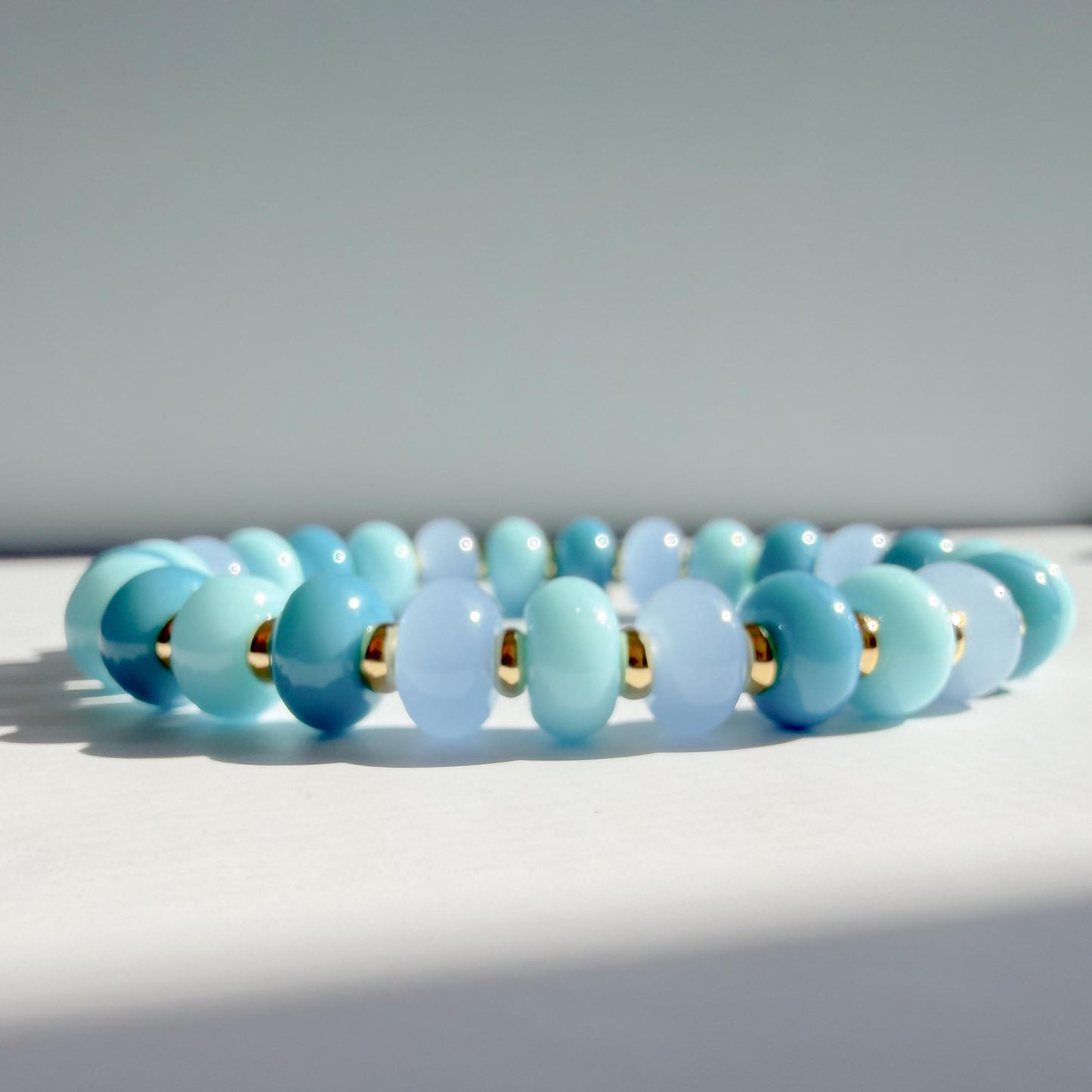 Ocean Blues Mix  | 18k Gold Filled with Blue, Soft Blue and Teal Flat Rondelle Beads | Colorful | Beaded Stretch Bracelet | Transparent bead
