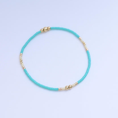 Signature Jasmine Stack | 14k Gold Filled Non-Tarnish with Teal, Cream and Gold Seed Beads | Stretch Beaded Bracelet Stack | Tiny| Triangle
