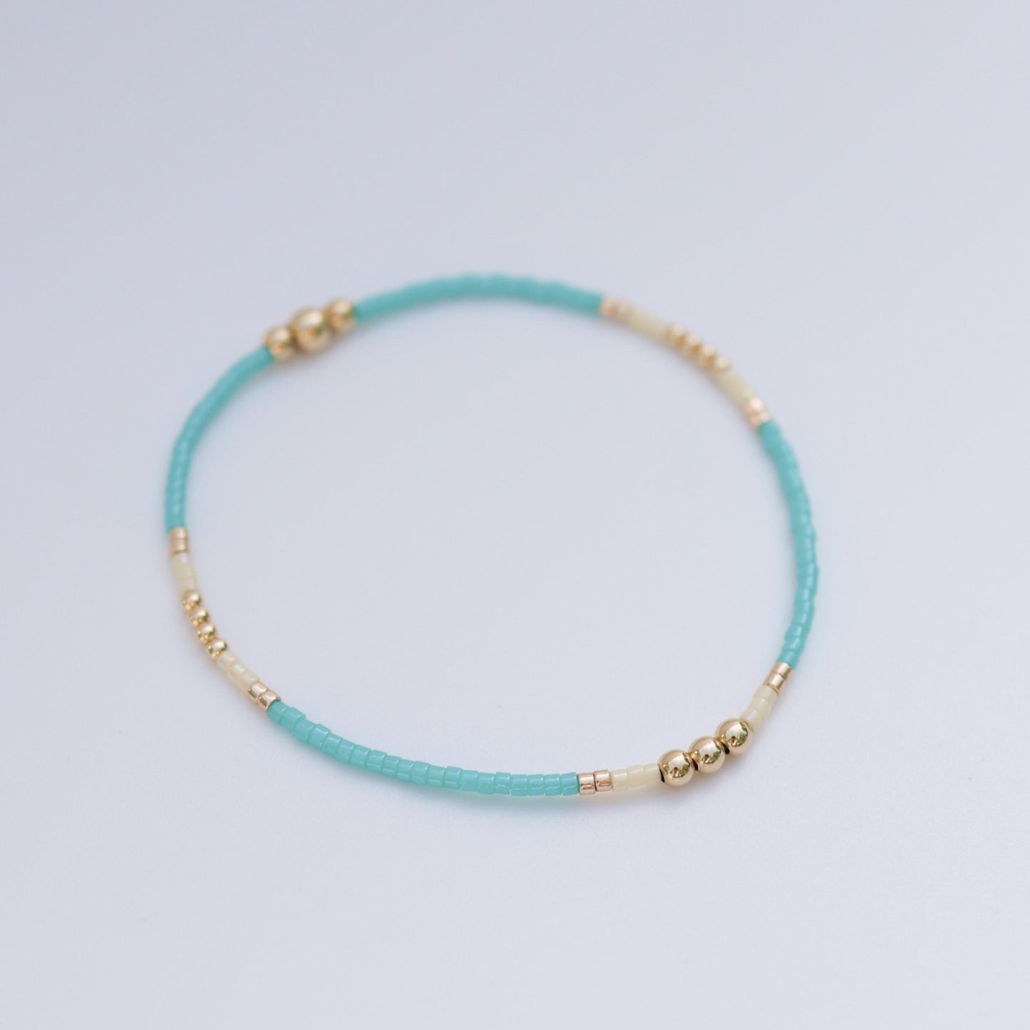 Signature Jasmine Stack | 14k Gold Filled Non-Tarnish with Teal, Cream and Gold Seed Beads | Stretch Beaded Bracelet Stack | Tiny| Triangle