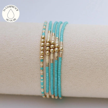 Signature Jasmine Stack | 14k Gold Filled Non-Tarnish with Teal, Cream and Gold Seed Beads | Stretch Beaded Bracelet Stack | Tiny| Triangle