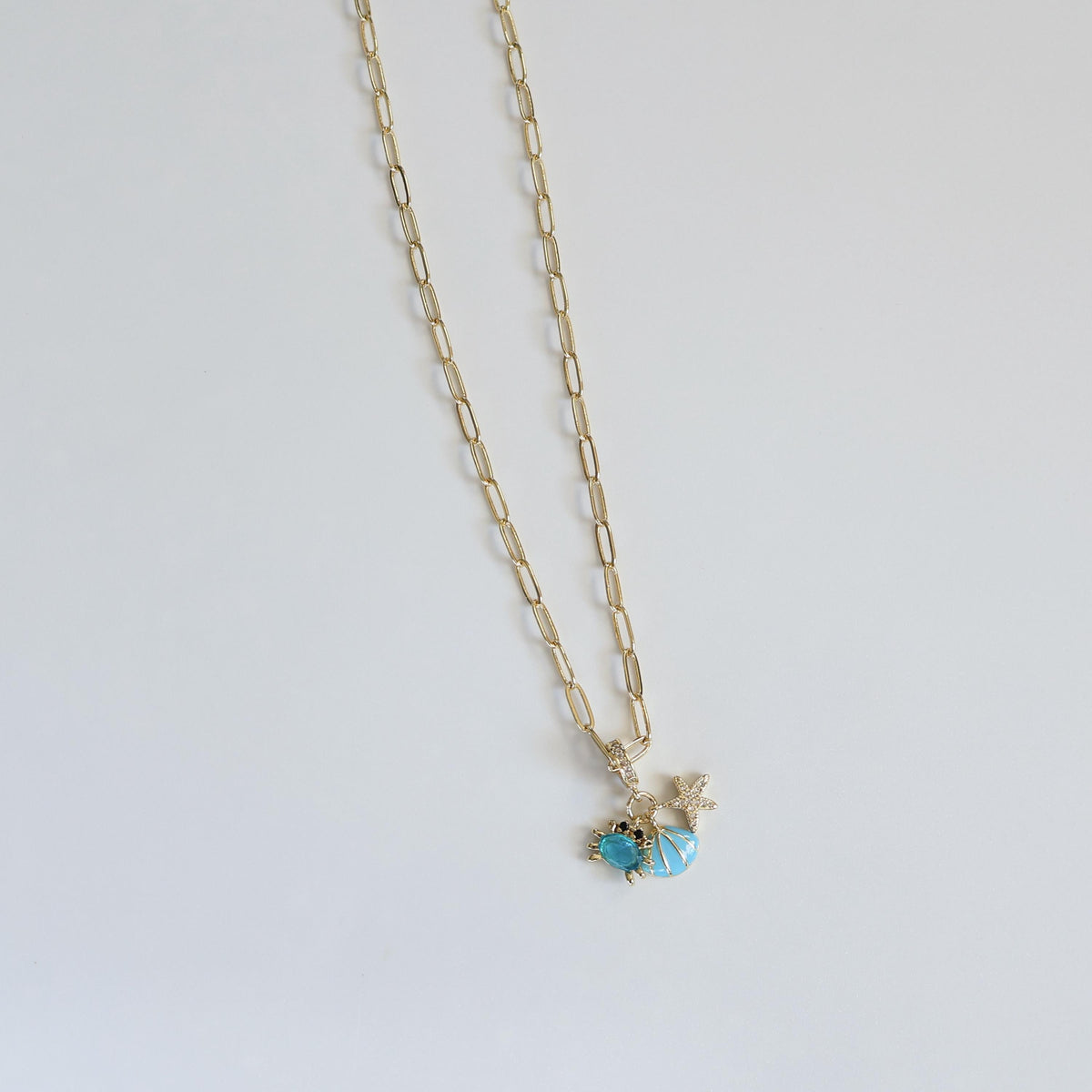 The Ocean Necklace | Paperclip Chain Necklace with Seashell, Crab and Starfish Charm