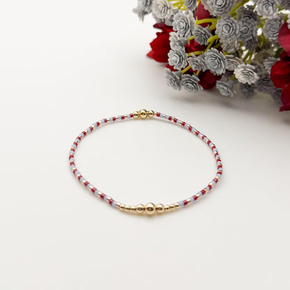 Signature Crimson Skies Stack | 14k Gold Filled Non-Tarnish Stack with Maroon and Sky Blue | Tiny Bead Trending Gold Stretch Bracelets |