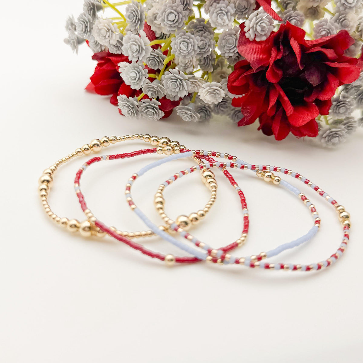 Signature Crimson Skies Stack | 14k Gold Filled Non-Tarnish Stack with Maroon and Sky Blue | Tiny Bead Trending Gold Stretch Bracelets |